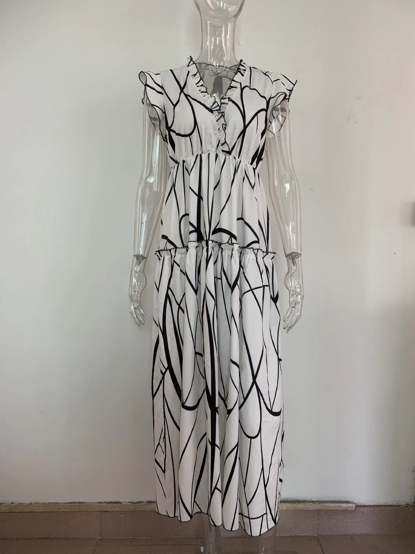 Geometric Printed Lotus Leaf Hem Maxi Dress